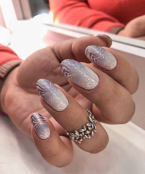Elegant manicure with stamping drawings