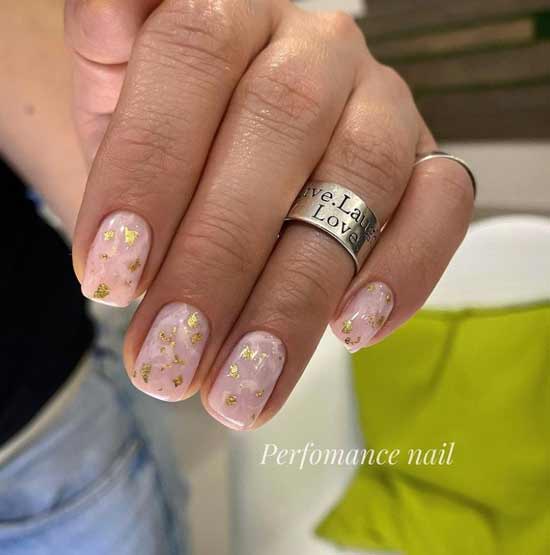 Beige nails with leaf