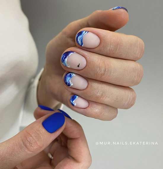 Blue French manicure with design
