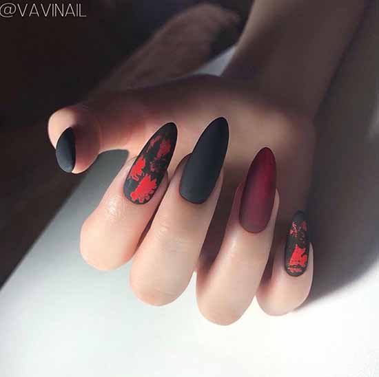 Matte black manicure with red foil