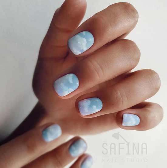 Matte manicure with clouds photo