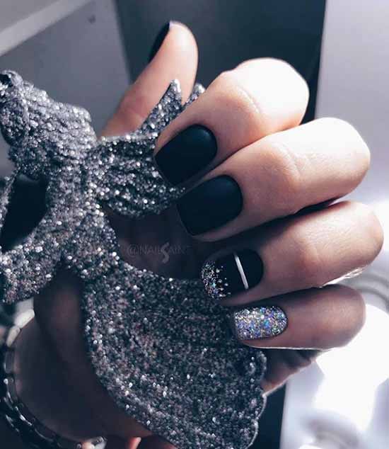Glitter on a black background of nails