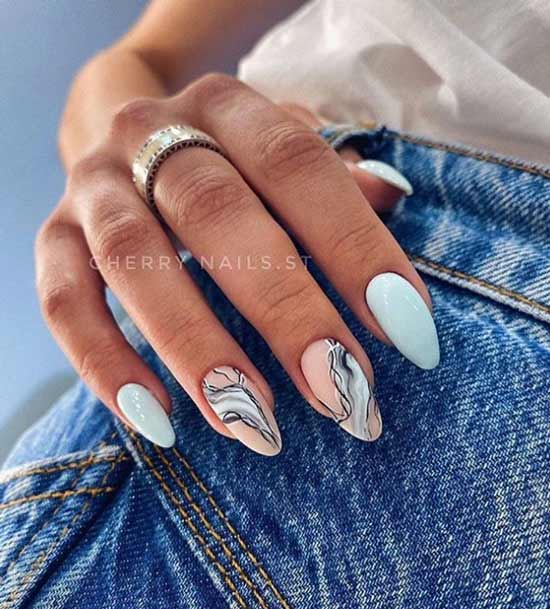Blue manicure with designs