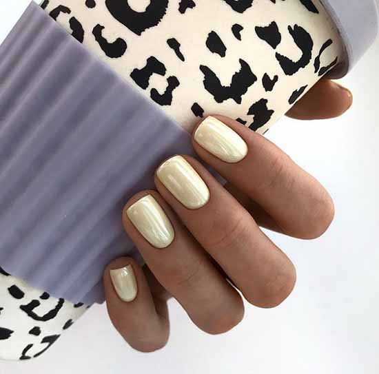 Delicate yellow manicure with rub