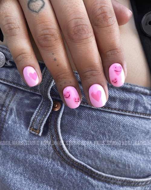 Manicure pink heart on nails