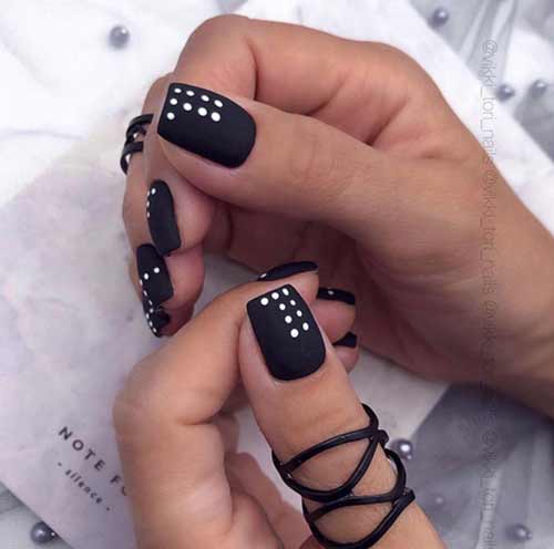 Matte black with white dots manicure