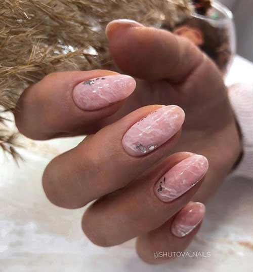Delicate barely noticeable marble on the nails