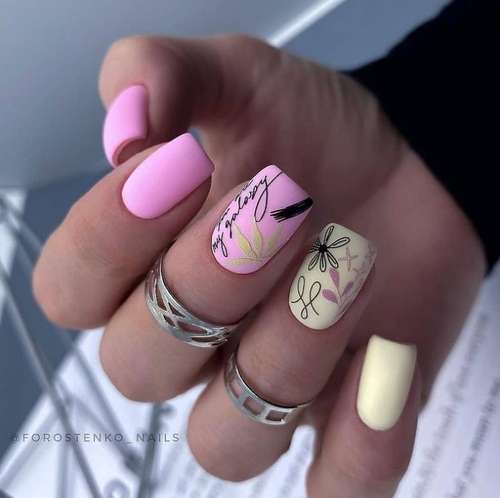 Pink manicure with stickers
