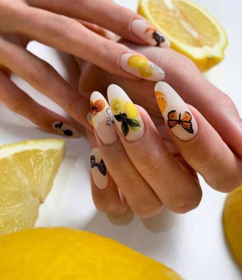 Manicure with multicolored butterflies