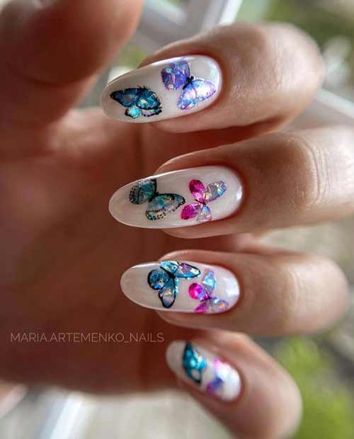 Manicure with colored butterflies