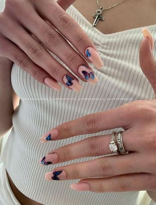 Blue butterflies on nails