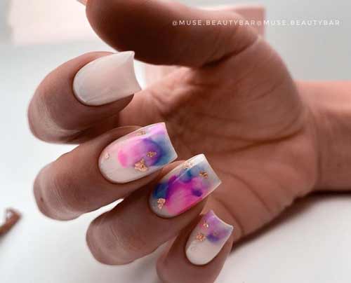 Watercolor stains on nails