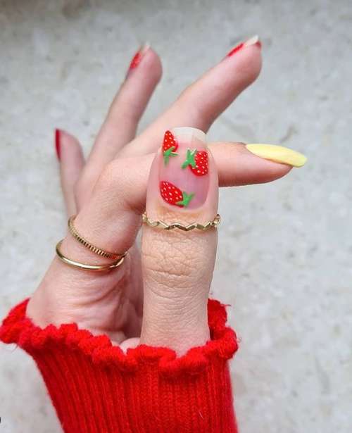 Bright strawberries on nails