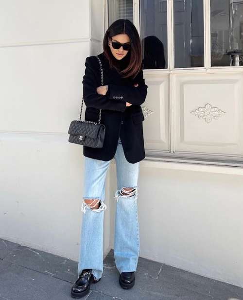 Light blue ripped knee jeans